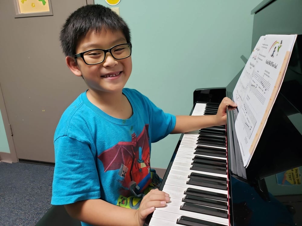 Piano lesson boy in Katy